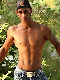 gypsy tattooed guy shows his muscles and beautiful body